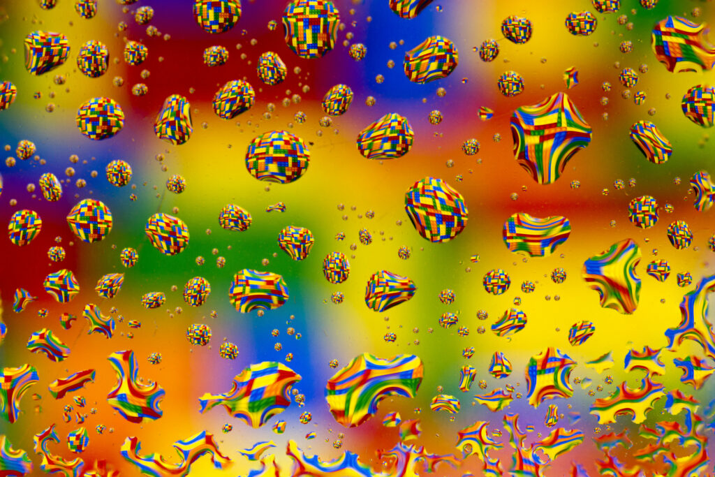 Vibrant Bubbles & Drops Wallpaper: Colorful Pixelated Background