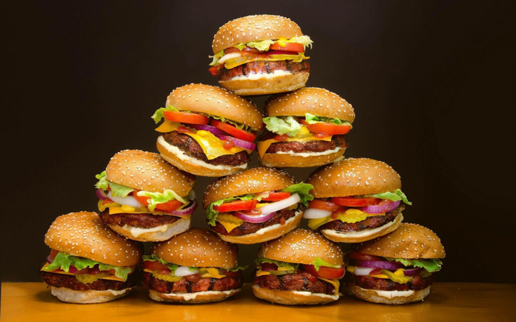 Burger King Whopper Stack wallpaper with juicy burgers lettuce tomatoes onions cheese sesame buns