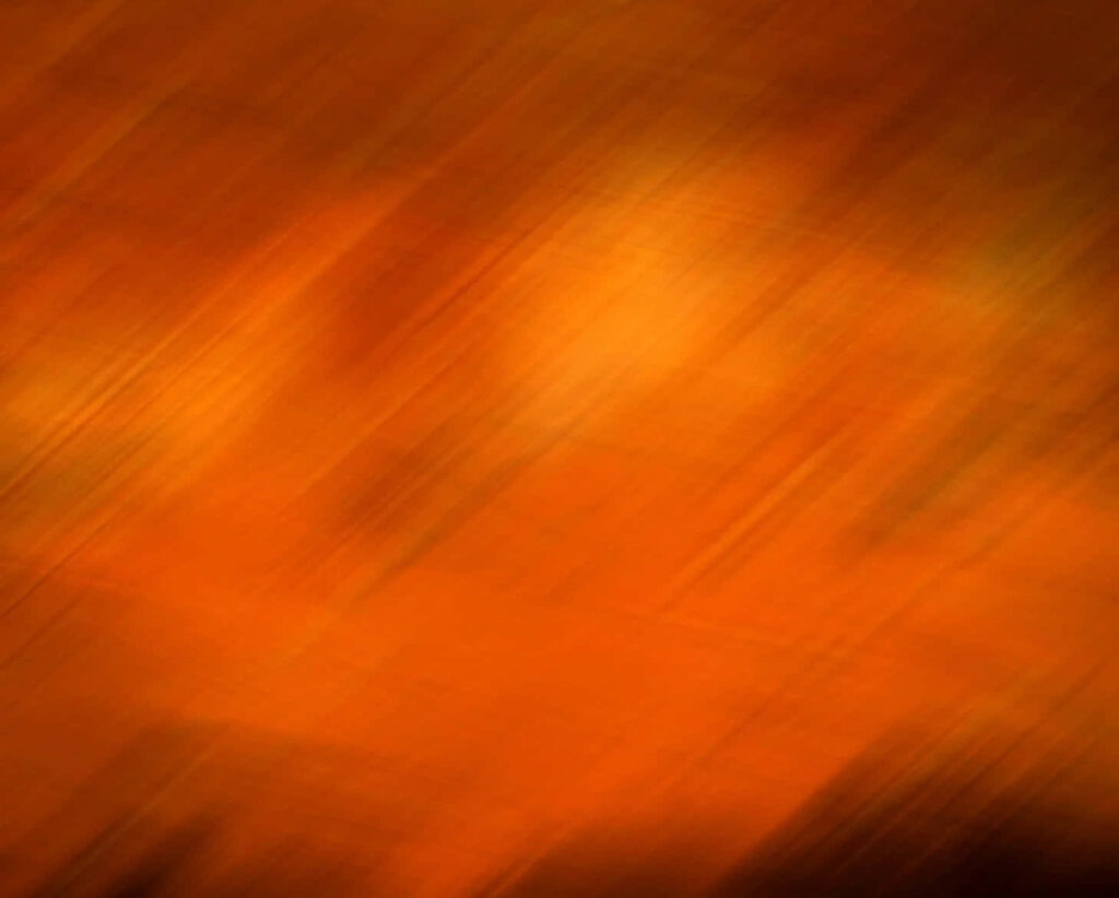 Vibrant Burnt Orange Sunset Sky Wallpaper - Warm Ambient Background