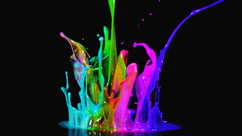 Colorful Chaos: A Vibrant 3D Laptop Wallpaper Splashed with Multicolored Paint on a Dark Canvas