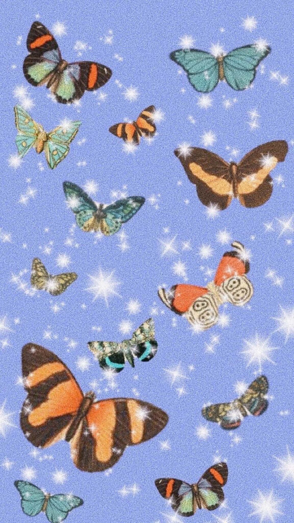 Colorful Butterfly Wallpaper: Dreamy Stars & Soft Blue Background