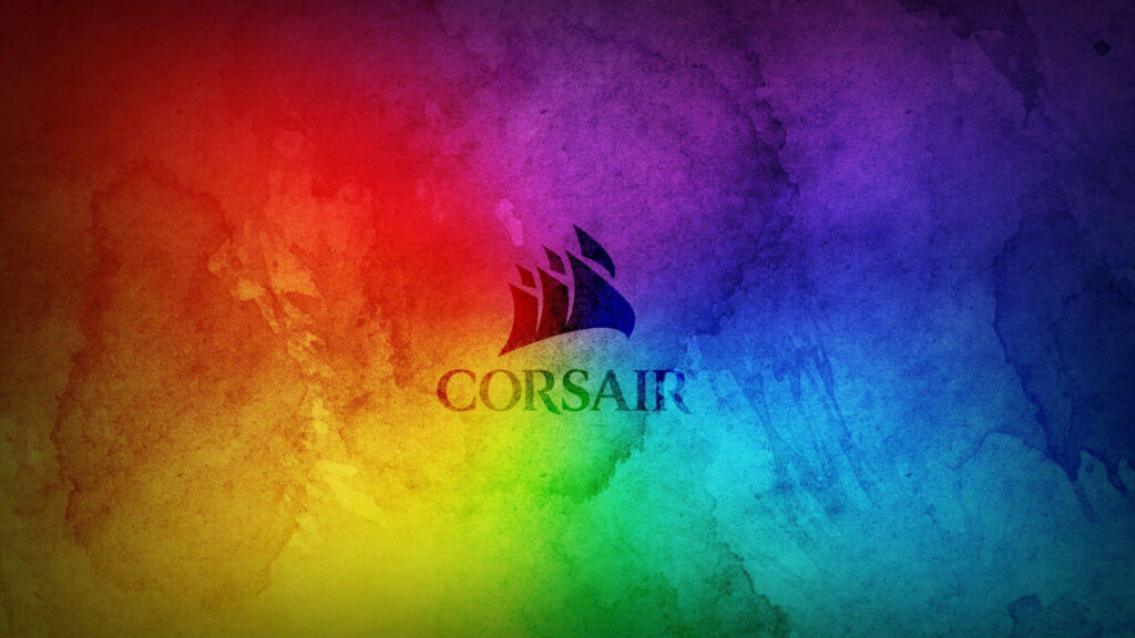 CORSAIR ship logo on vibrant watercolor gradient background with red orange yellow green blue purple hues Wallpaper
