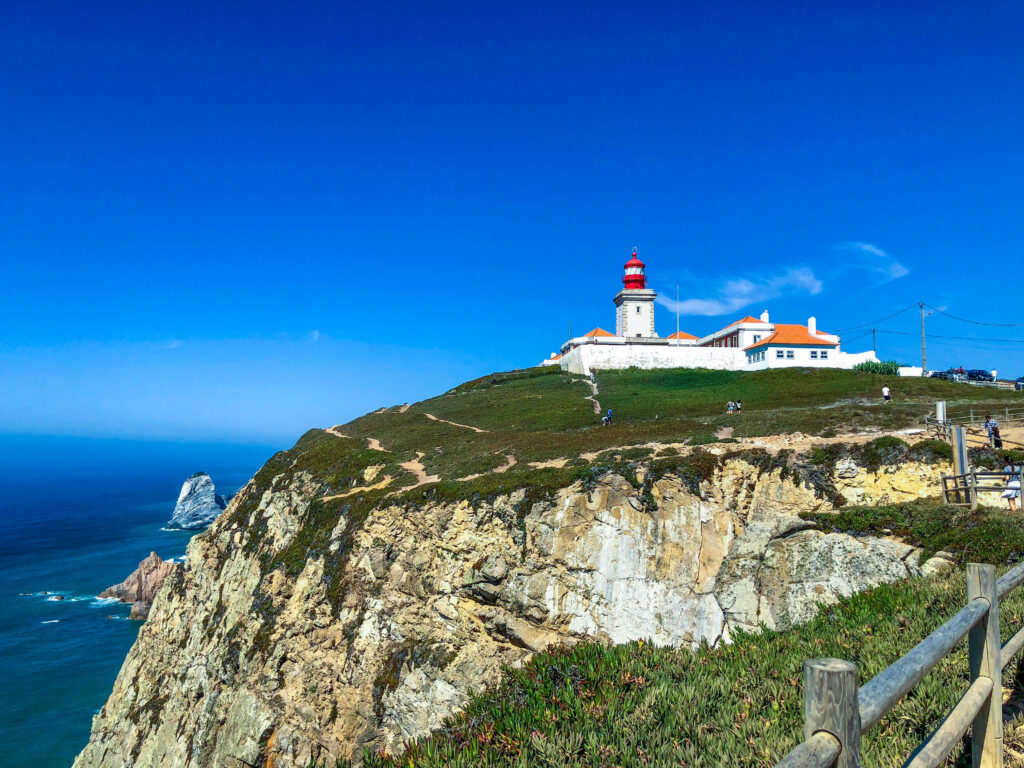 Stunning Cabo da Roca Lighthouse Wallpaper: Rugged Cliffs & Atlantic Blue