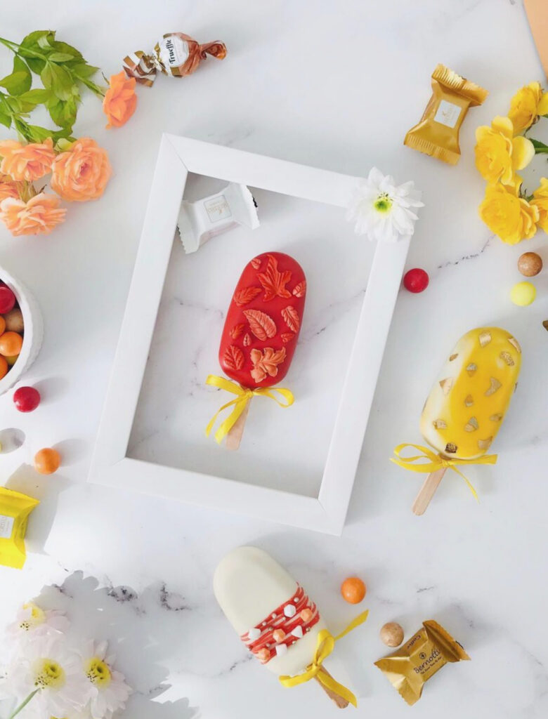 Colorful Cake Pops Wallpaper with Flowers & Sweets Background