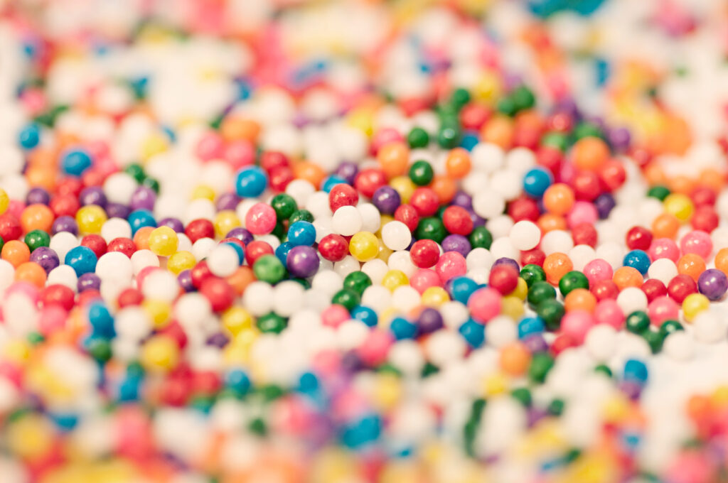 Vibrant Candy Sprinkles Wallpaper - Sweet & Colorful Background Delight