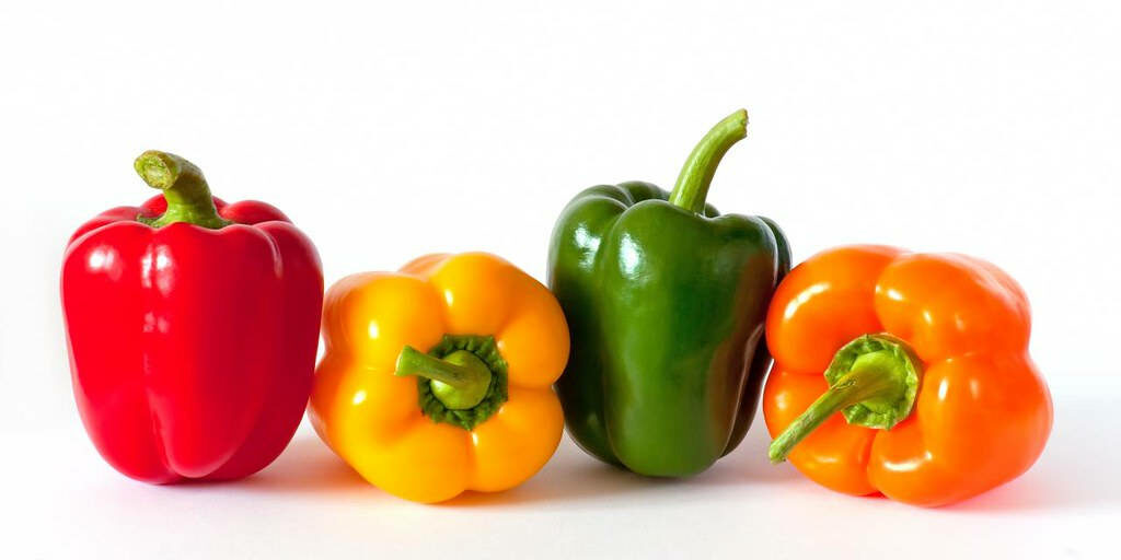 Colorful Capsicum Wallpaper: Fresh Red, Yellow, Green, Orange Display