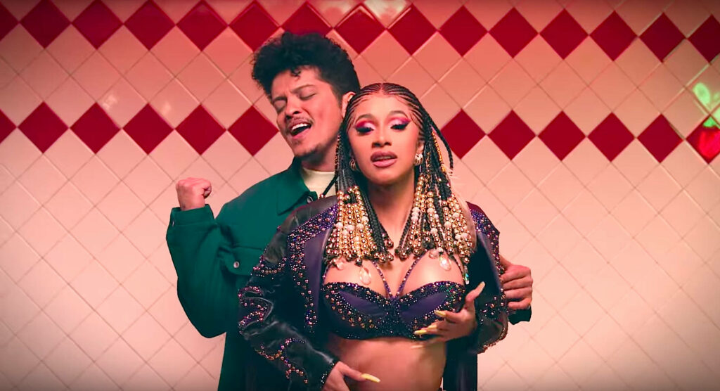 Vibrant Wallpaper of Cardi B & Bruno Mars: Stylish & Dynamic Energy