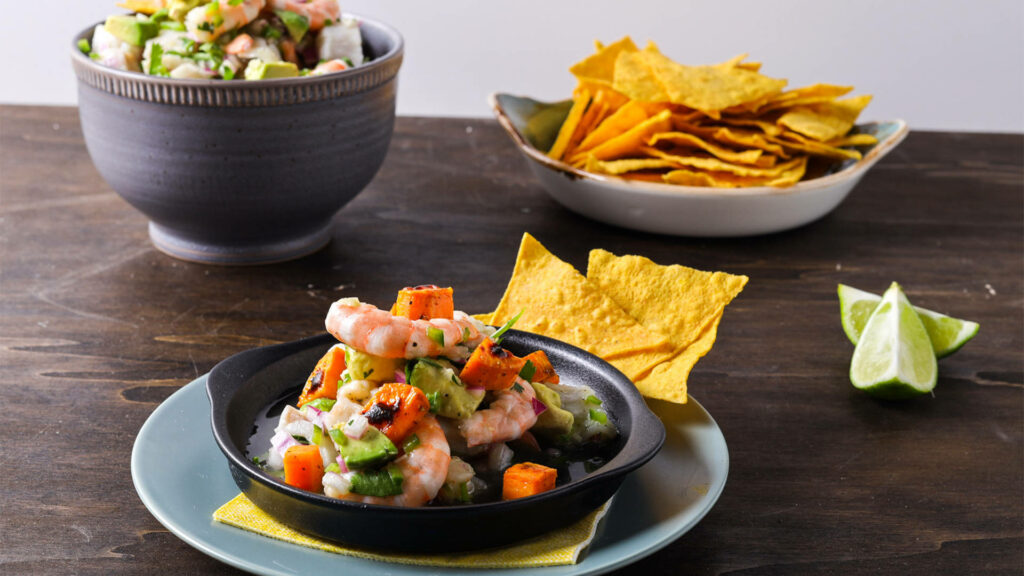 Vibrant Ceviche Wallpaper: Shrimp & Fish with Chips and Veggies