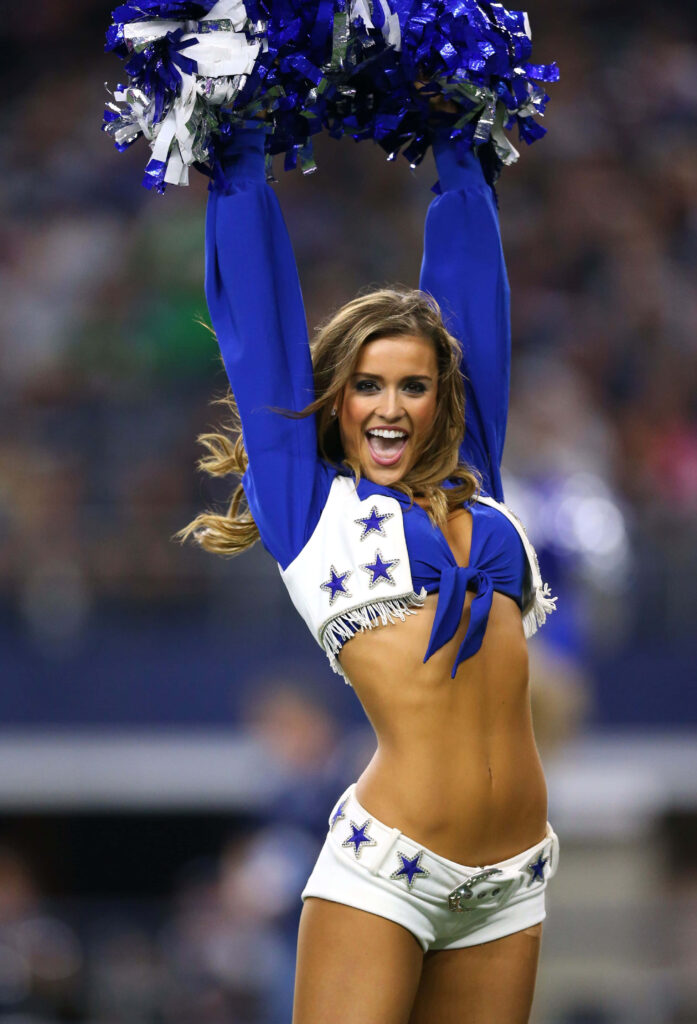Dynamic Cheerleader in Blue & White Wallpaper Background