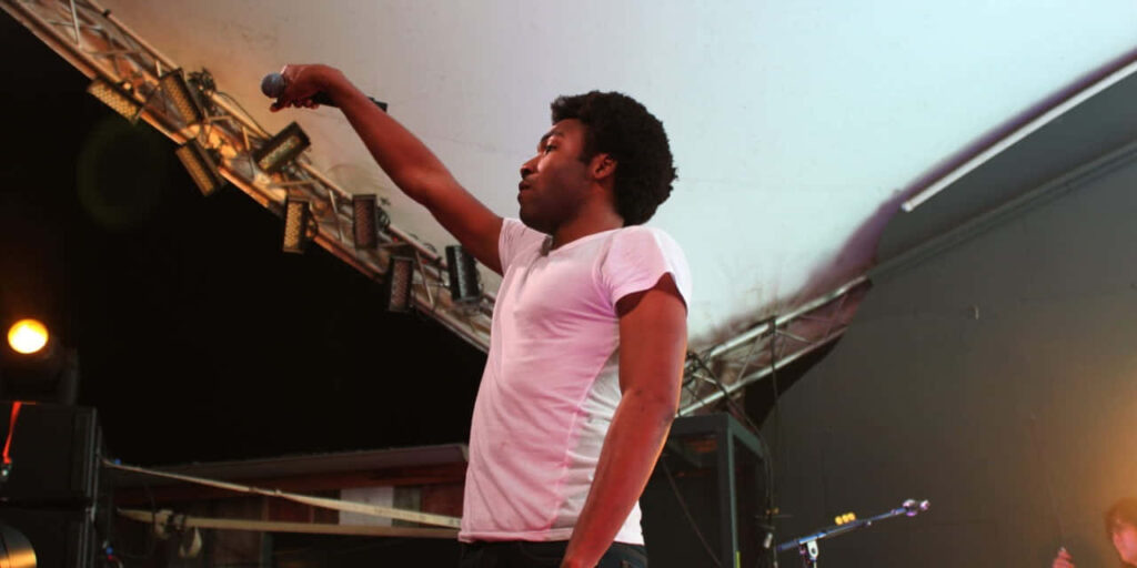 Vibrant Childish Gambino Wallpaper: Capturing Live Performance Energy