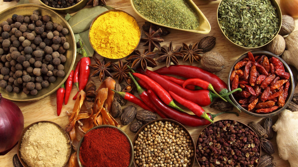 Vibrant Chili Peppers & Spices Wallpaper Background for Culinary Lovers