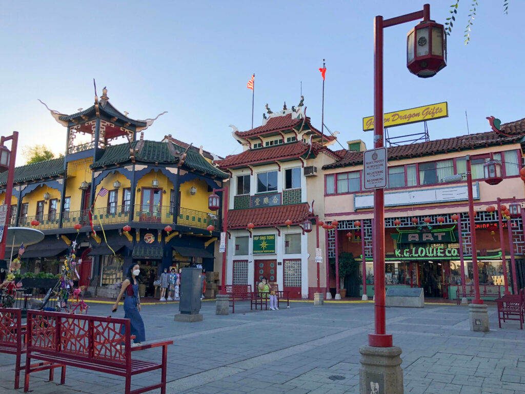 Vibrant Chinatown Los Angeles street with colorful architecture red lanterns and blue sky wallpaper