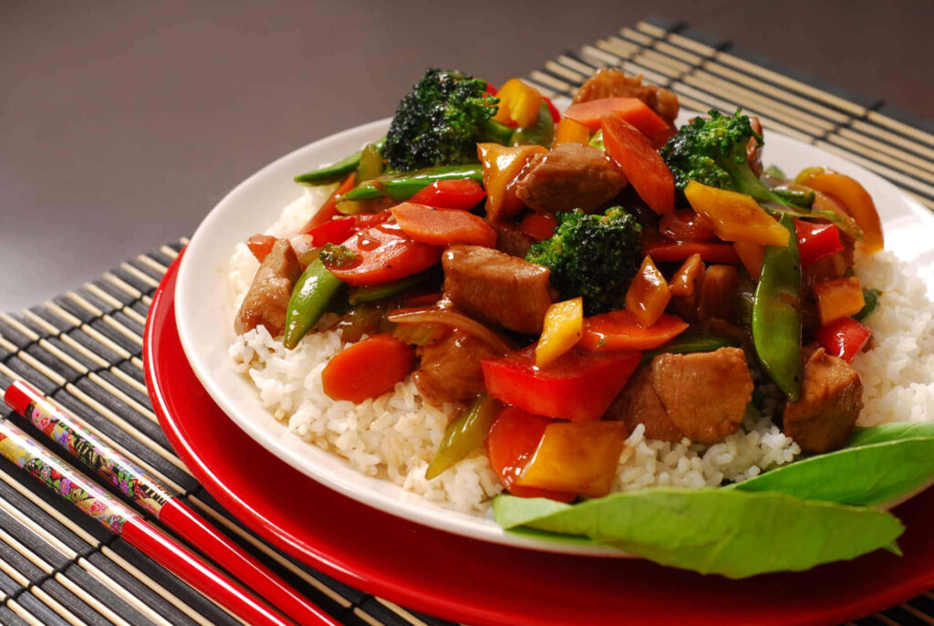 Vibrant Chinese Cuisine Wallpaper: Tasty Stir-Fried Dish & Rice