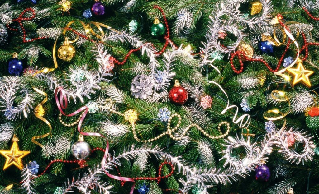 Vibrant Christmas Wallpaper: Colorful Ornaments & Tinsel Background