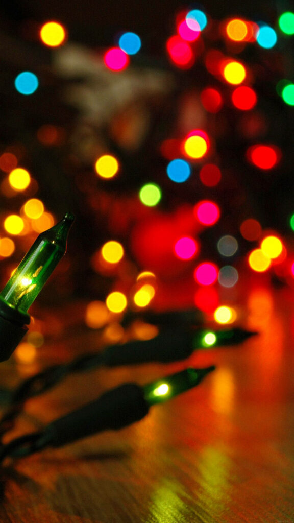 Vibrant Christmas Lights Wallpaper with Festive Bokeh Background