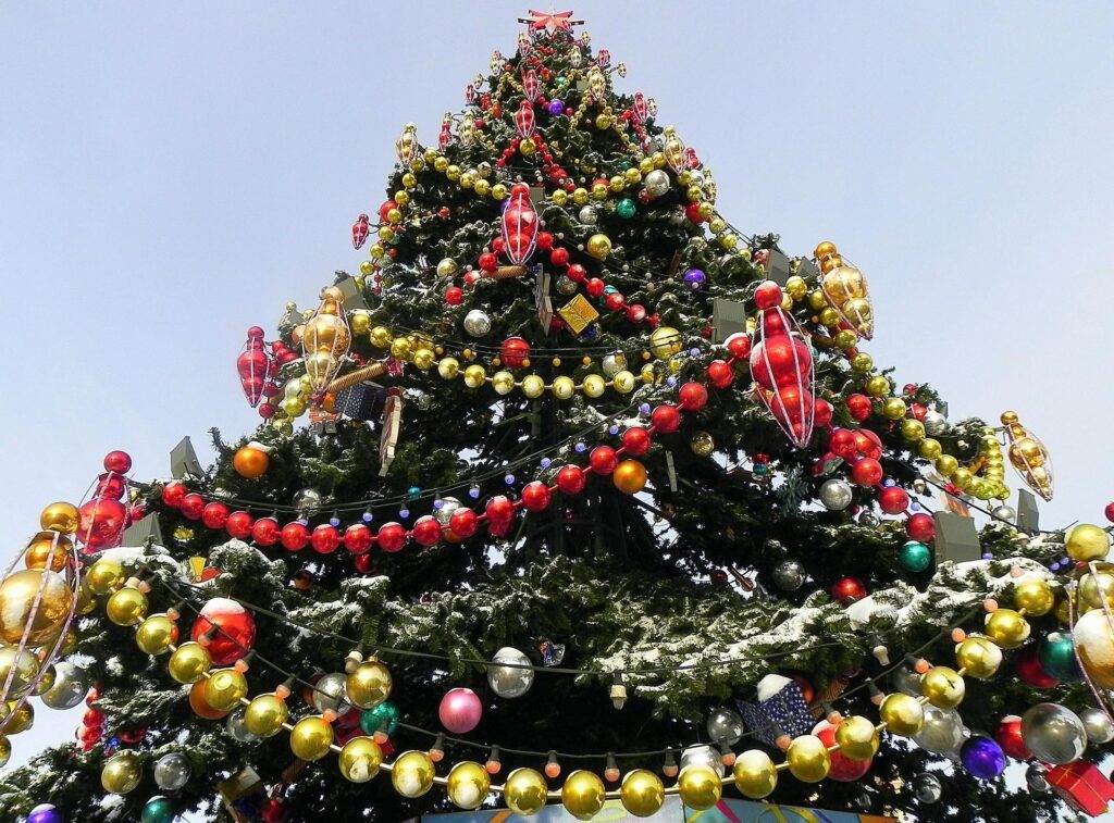 Colorful Christmas Tree Wallpaper: Joyful Holiday Spirit Background