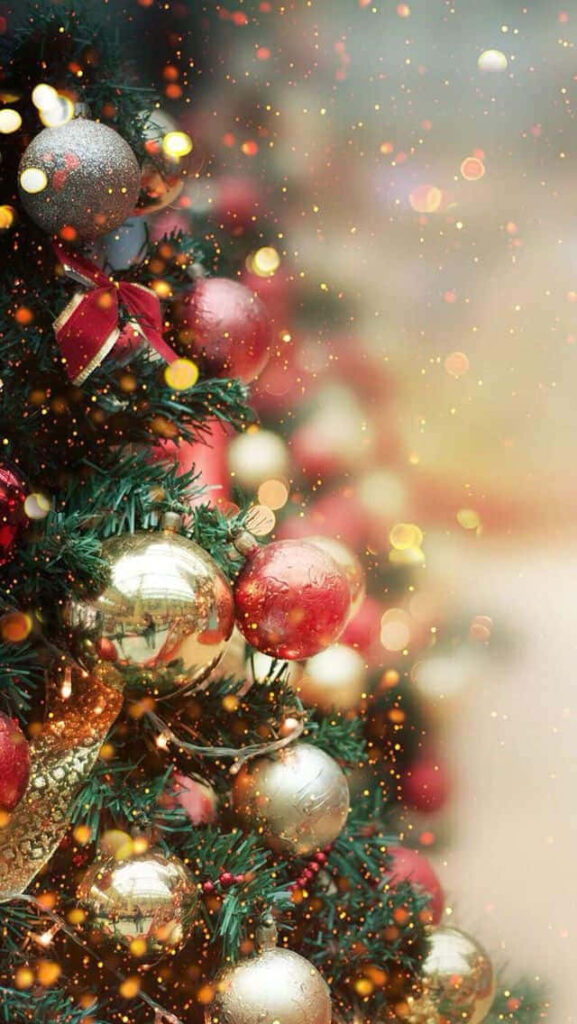 Vibrant Christmas Tree Wallpaper with Festive Bokeh Background