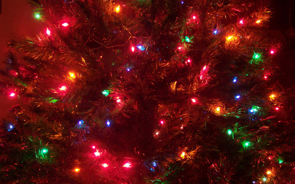 Vibrant Christmas Tree Wallpaper for a Festive Holiday Background