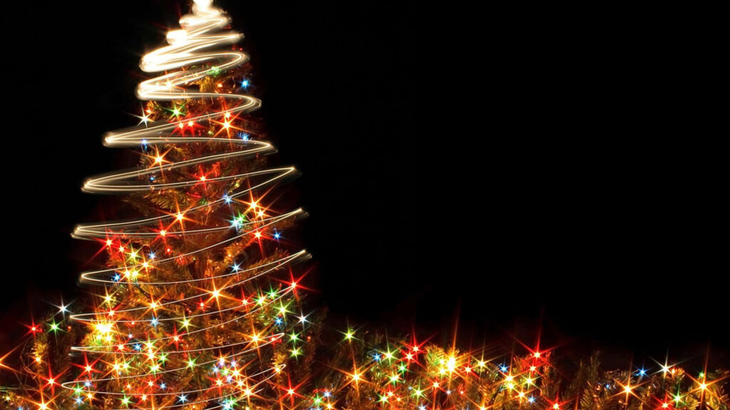 Vibrant Christmas Tree Wallpaper: Festive Lights on Dark Background