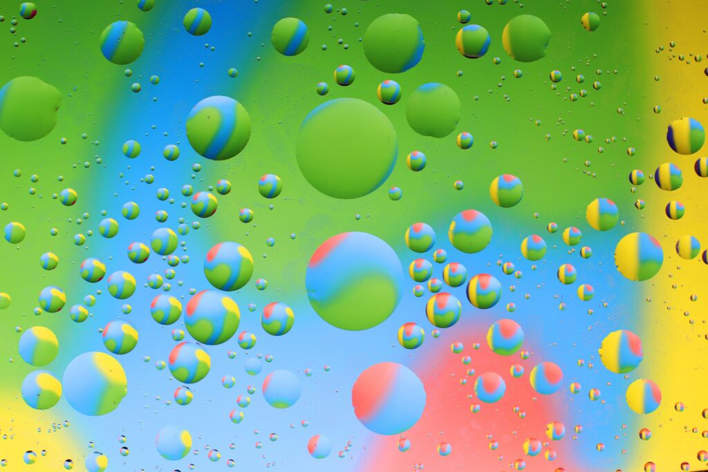 Vibrant Circles & Bubbles on Colorful Gradient Background Wallpaper