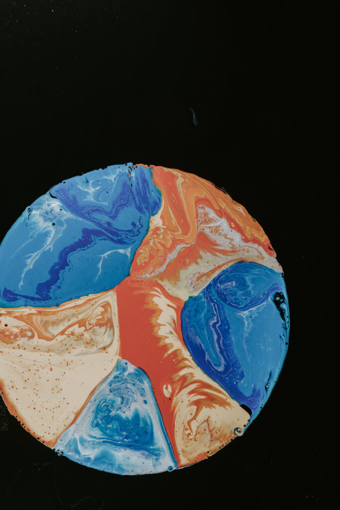 Vibrant Circular Abstract Wallpaper - Colorful Design on Dark Background