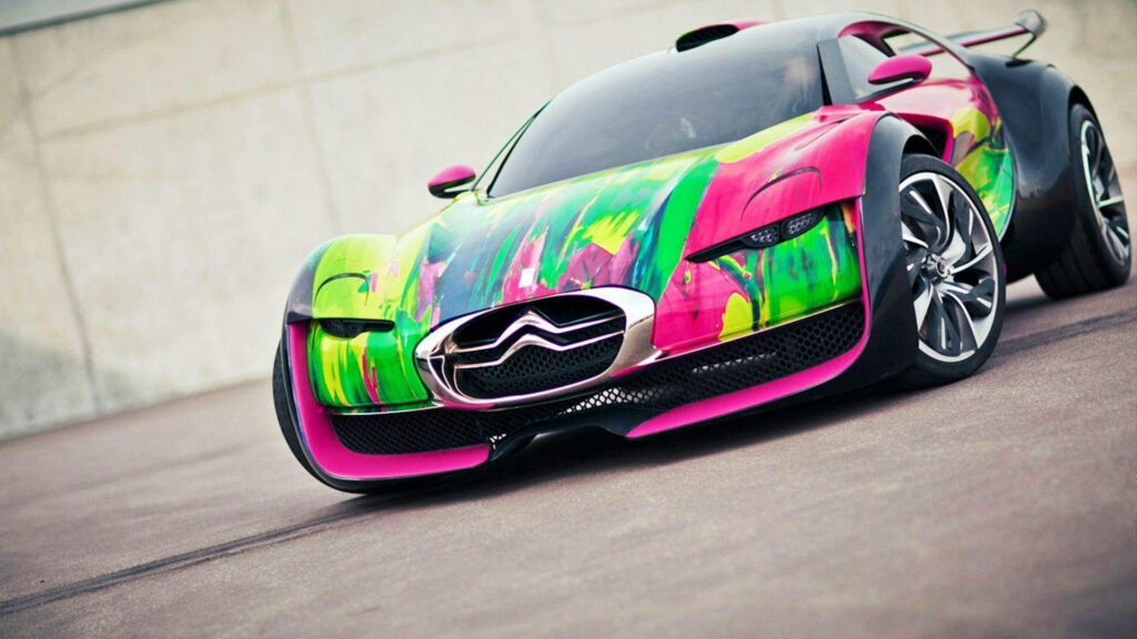 Citroen sports car in motion with bright colorful paint splashes dynamic modern wallpaper