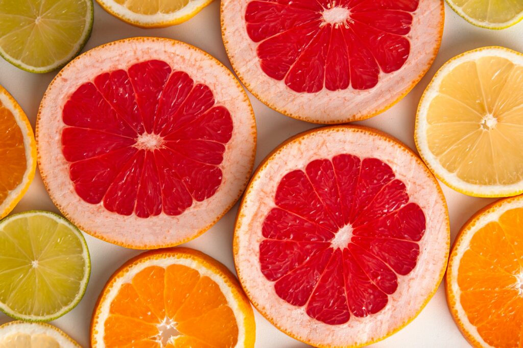 Vibrant Citrus Fruit Slice Wallpaper Background for a Fresh Look