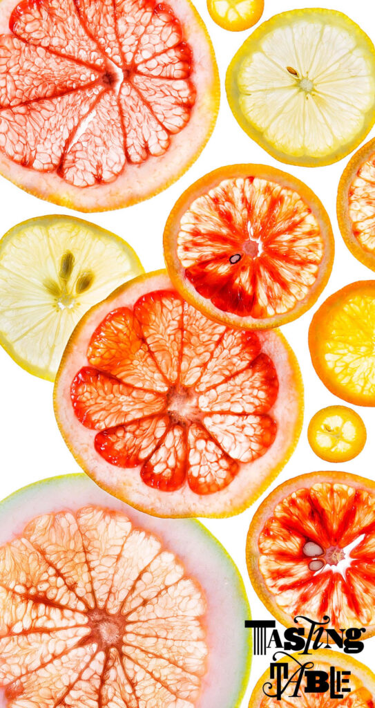 Vibrant Citrus Fruit Wallpaper: Colorful Grapefruit, Orange, & Lemon Slices