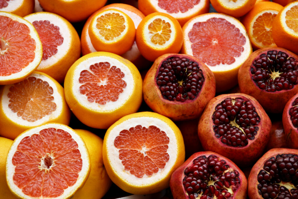 Vibrant Citrus & Pomegranate Wallpaper for a Refreshing Background