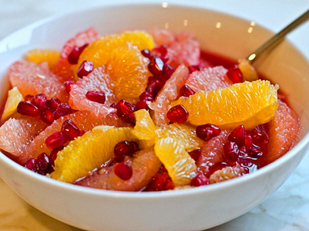Vibrant Citrus & Pomegranate Salad Wallpaper Background