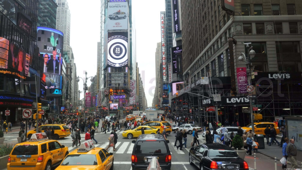 Vibrant City Intersection Wallpaper: Taxis, Billboards & Crowds