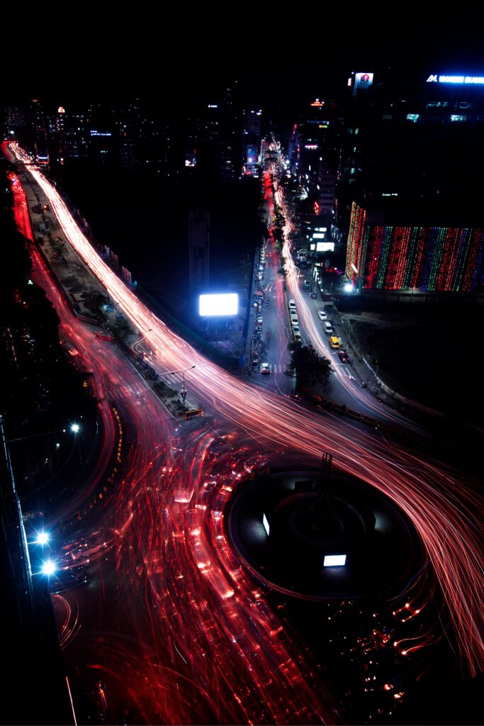 Vibrant City Night Aerial Wallpaper: Stunning Long-Exposure View