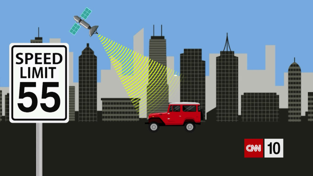Vibrant City Wallpaper: Red Vehicle & Skyscrapers with Tech Signals