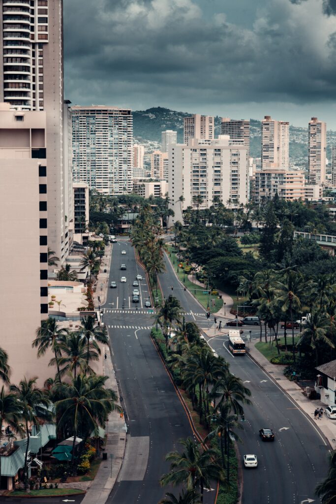 Vibrant Cityscape Wallpaper: Aerial View with Modern Buildings & Palms