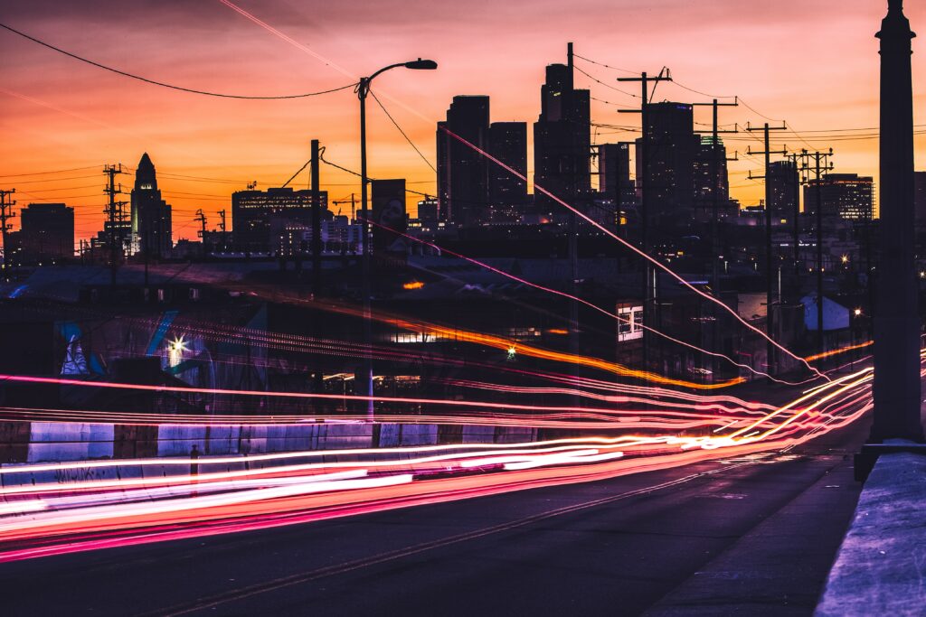 Stunning Night Cityscape Wallpaper: Vibrant Lights & Sunset Glow