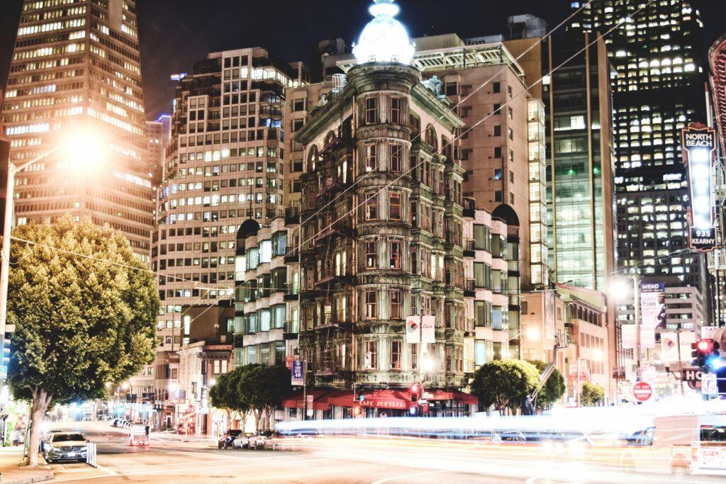 Vibrant Cityscape Wallpaper: Historic & Modern Architecture at Night
