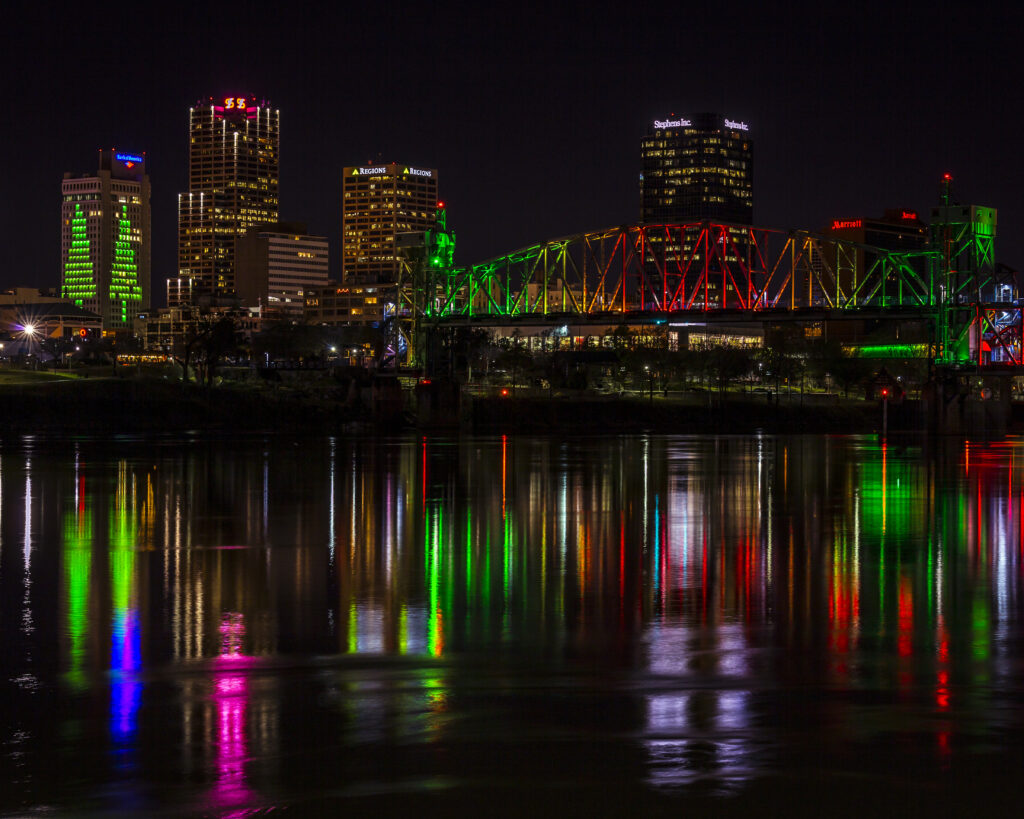 Vibrant Night Cityscape Wallpaper: Illuminated Urban Reflections