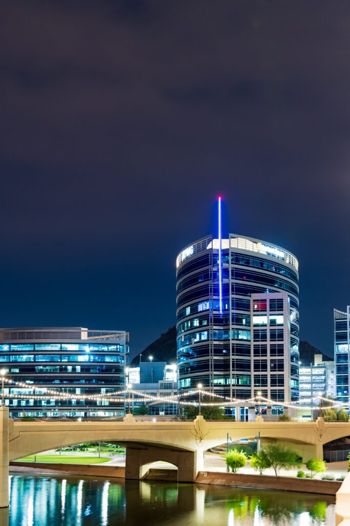 Vibrant Night Cityscape Wallpaper: Modern Lights & Reflections
