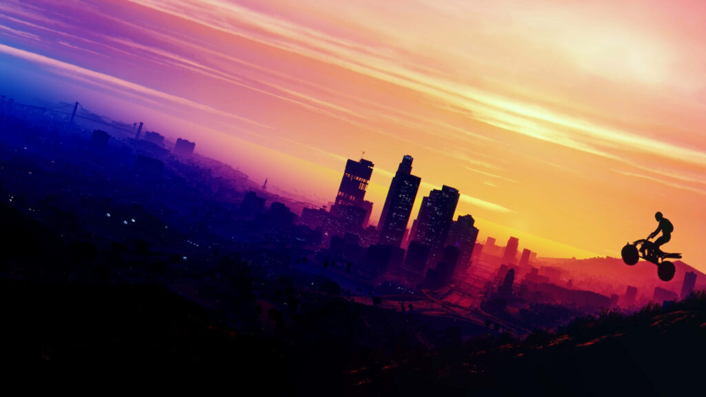Stunning Wallpaper: Rider on Bike with Vibrant City Sunset Background