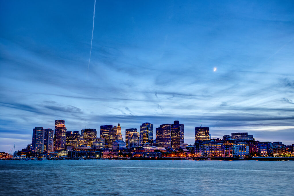 Vibrant Cityscape Dusk Wallpaper: Illuminated Waterfront Serenity