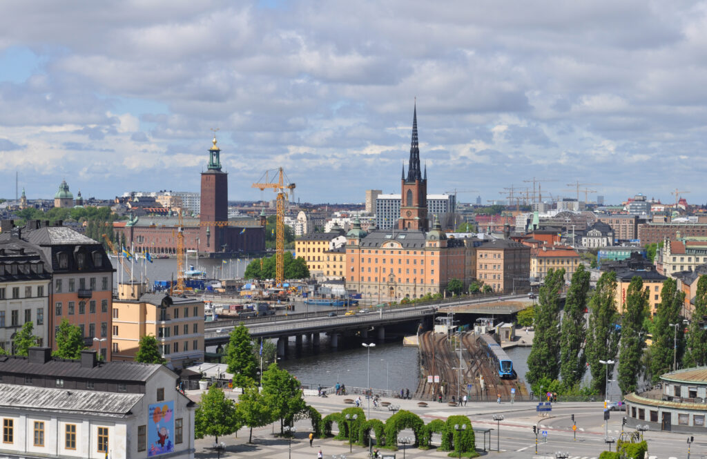 Vibrant Cityscape Wallpaper: Modern & Historic Architecture Blend