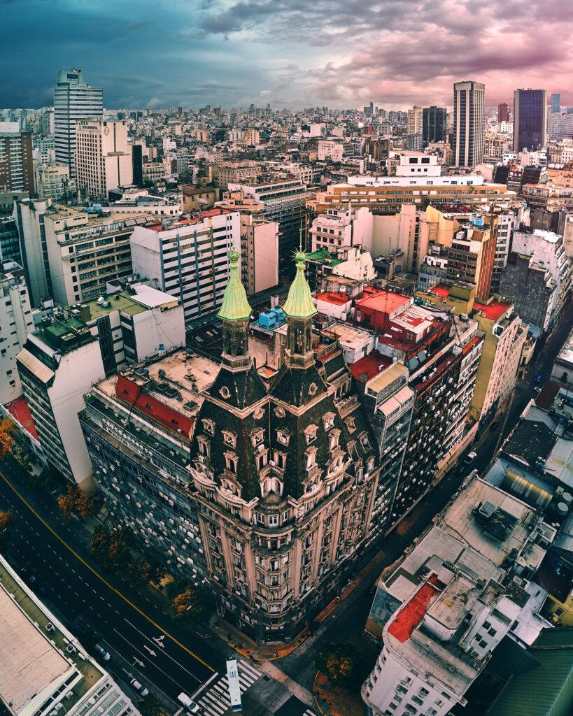 Vibrant Cityscape Wallpaper: Historic Tower & Modern Architecture