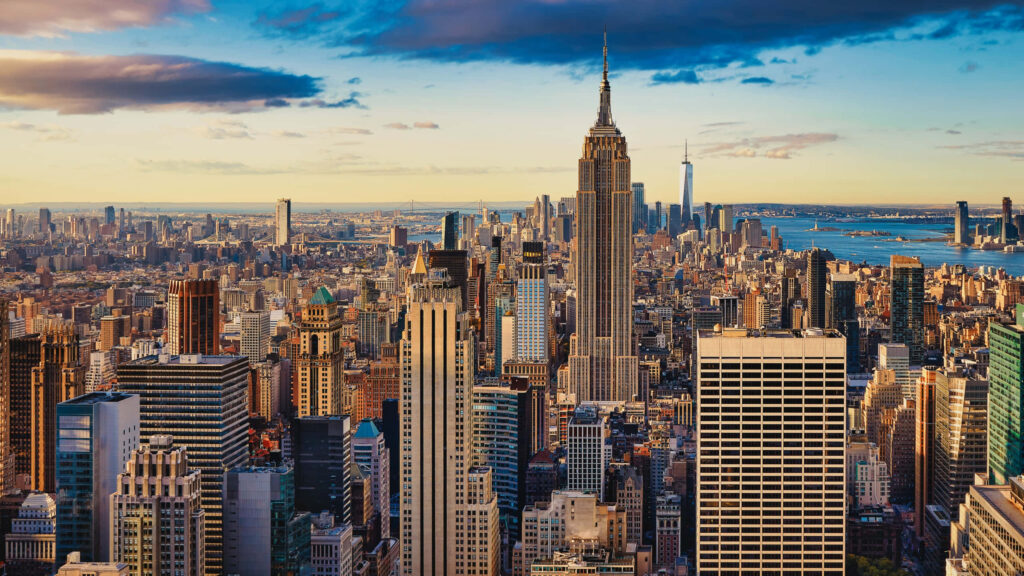 Stunning Cityscape Wallpaper: Skyscrapers & Vibrant Sky