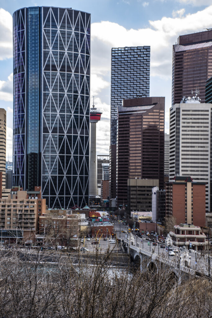 Vibrant Cityscape Wallpaper: Modern Buildings & Iconic Bridge