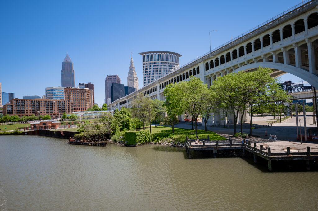 Vibrant Cityscape Wallpaper: Modern & Historic Architecture Over Water