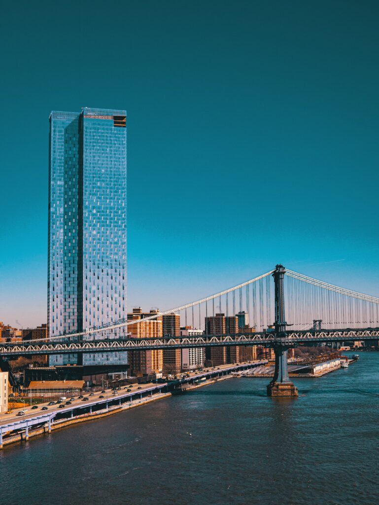 Vibrant Cityscape Wallpaper: Skyscraper, Bridge & Urban Beauty