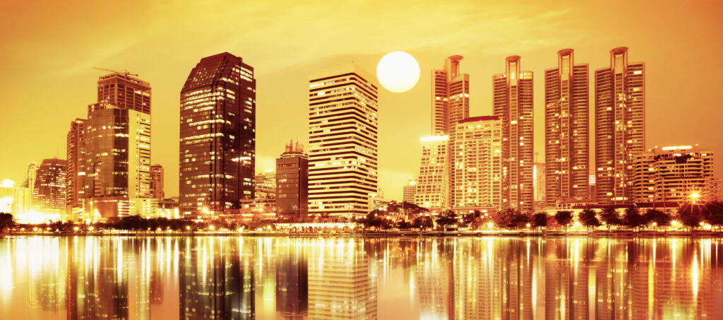 Vibrant Cityscape Wallpaper: Skyscrapers & Sunset Reflection