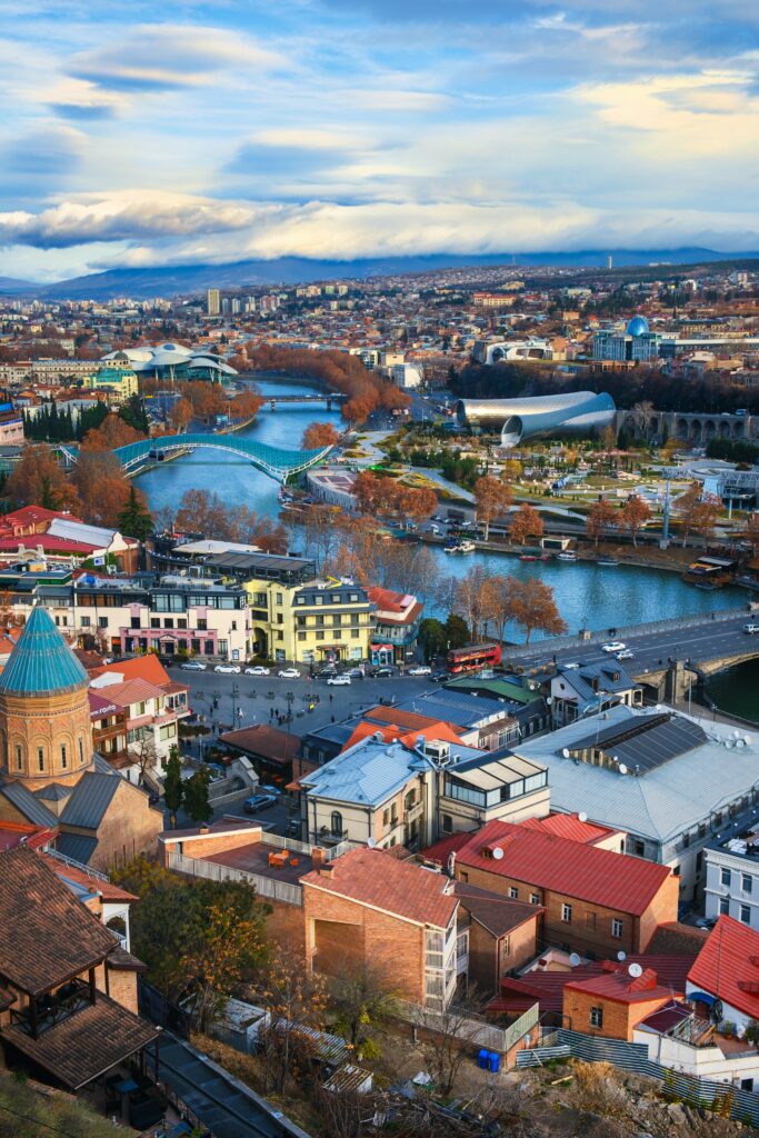 Vibrant Cityscape Wallpaper: Modern & Traditional Architecture Scene