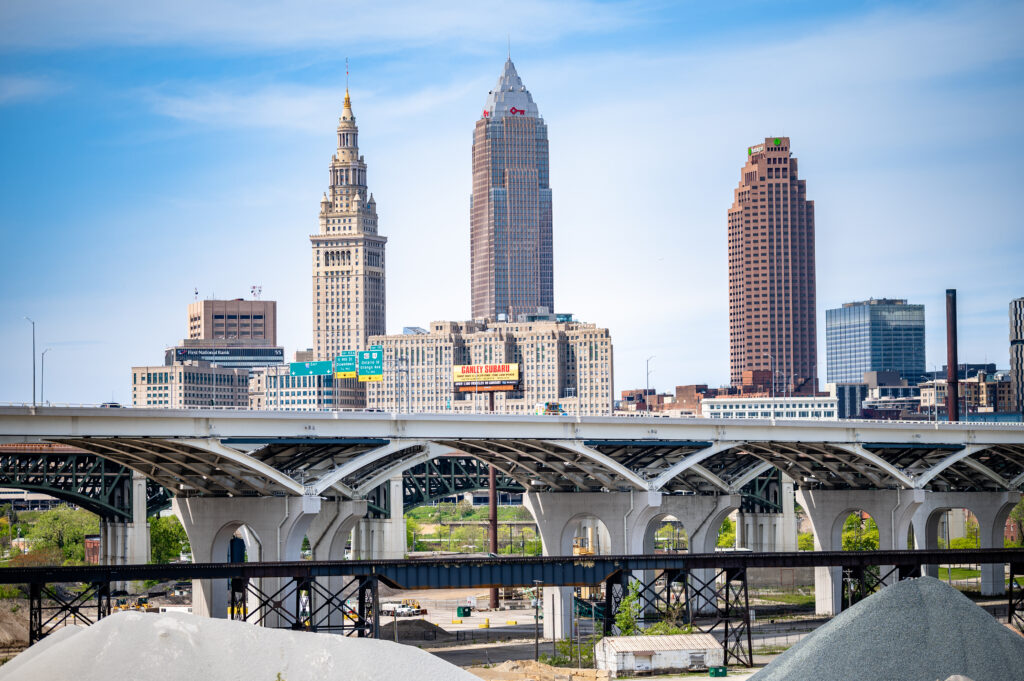 Vibrant Cityscape Wallpaper: Tall Buildings & Charming Bridge