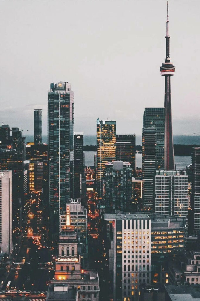 Vibrant Cityscape iPhone Wallpaper: Stunning Skyscrapers & Waterfront